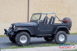 Jeep Wrangler w/Rebel Racing Bandit II in 15x10 Machined